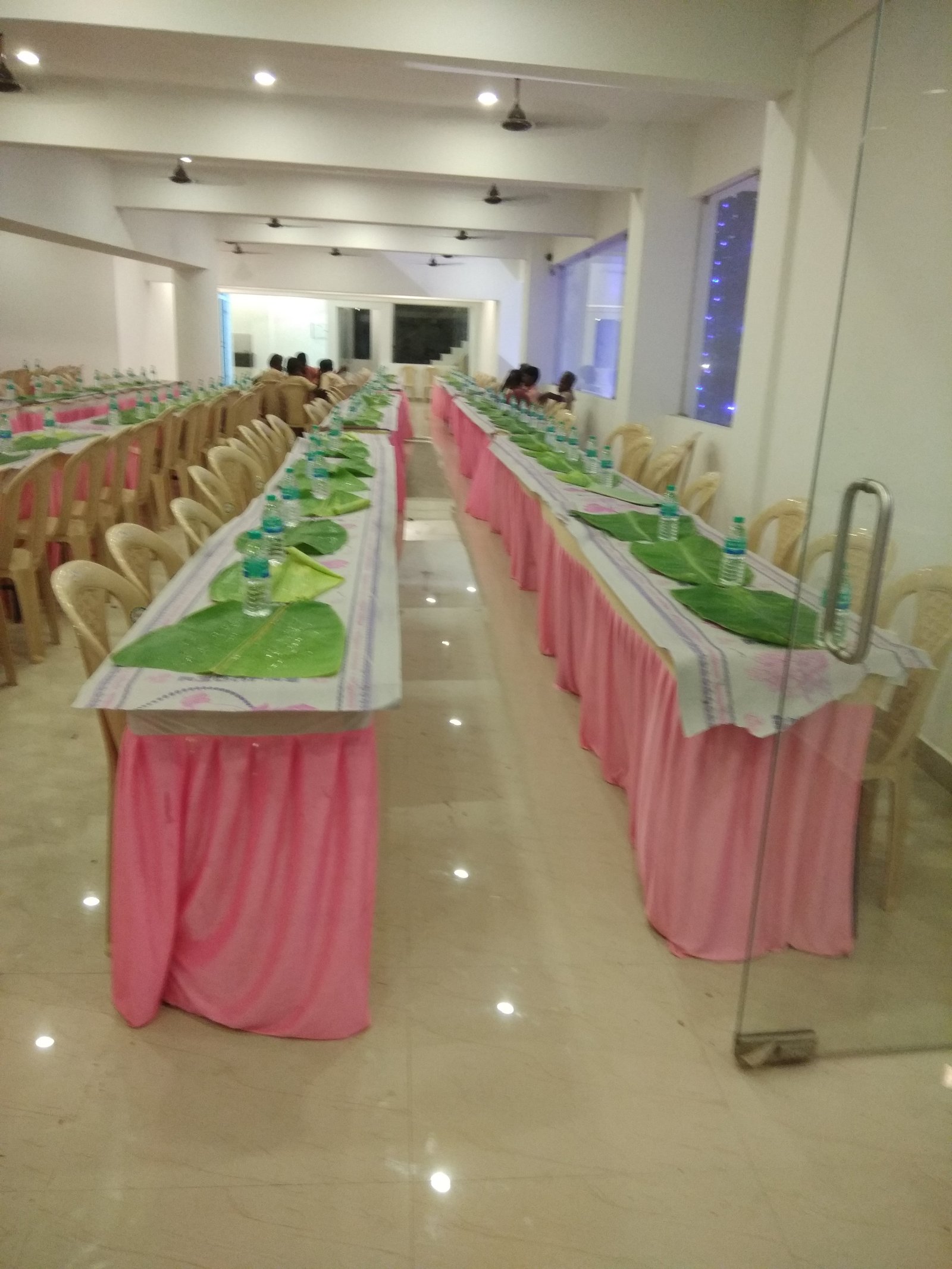 Elegant dining area setup at AARNA Mahal